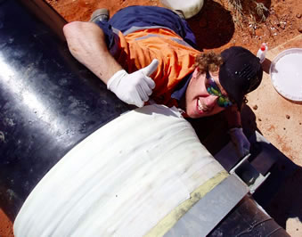 Rapp-it pipe repair bandage applied to a damaged pipe